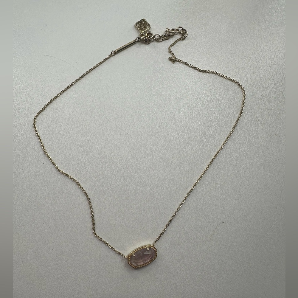 purple and sparkly kendra scott necklaces